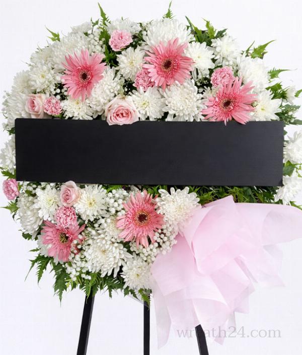 พวงหรีดพัทลุงชมพูอ่อน แสดงความอ่อนโยนสุภาพ