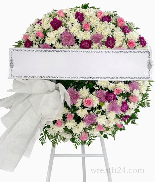 พวงหรีดสุโขทัยขนาดใหญ่ ดอกไม้แน่น โครงสร้างชัด เหมาะกับองค์กร