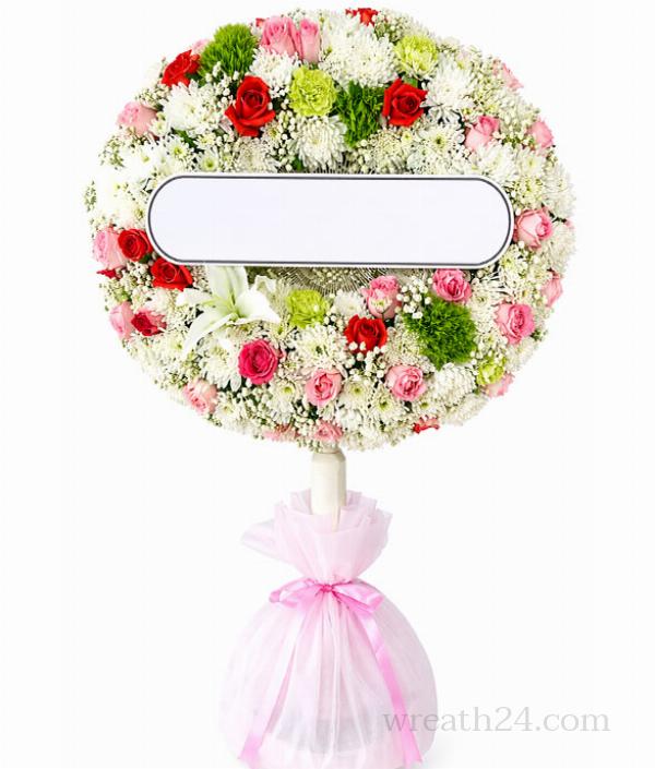 พวงหรีดพัดลมพรีเมียมตกแต่งดอกไม้สวยงามให้ทั้งความสวยและการใช้งานจริง